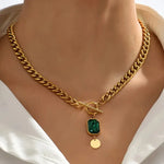 Gold Necklace with Emerald Pendant