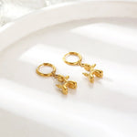 Gold Huggie Earrings with Mini Ballon Hond Charme
