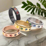 Spinning Stress-Reducing Paw Ring – Stainless Steel with Rainbow Paws